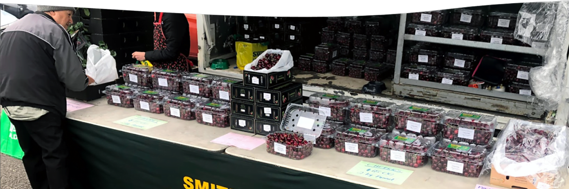 smiths fruit cherry stall at a market